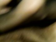 Footjob in collant mentre guarda la tv