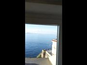 Inculata panoramica sul balcone